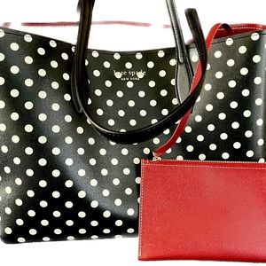 kate spade leather black with white polka dots and red lining.
